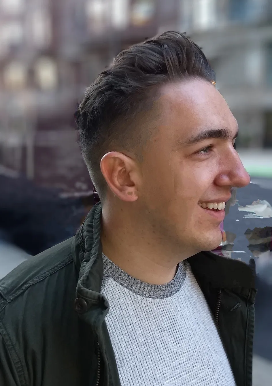 Barber sculpting beard lines